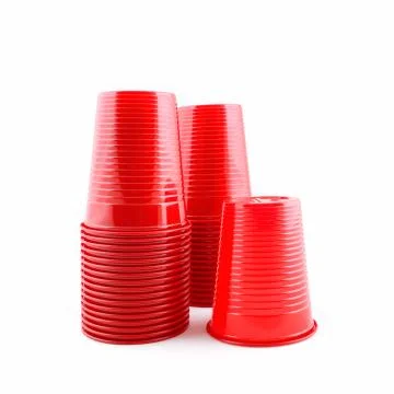 Plastic red cups stack on white background Stock Photos