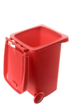 Plastic red trash can isolated on white background Stock Photos