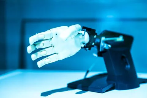 Plastic robot hand with open palm gesture Stock Photos