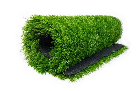 Plastic roll of green grass on white background Stock Photos