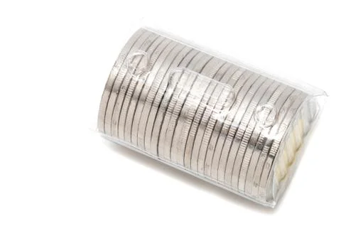 Plastic roll holding two dollar coins Stock Photos