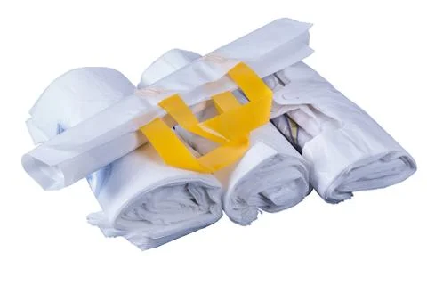 Plastic rolled up bag Stock Photos