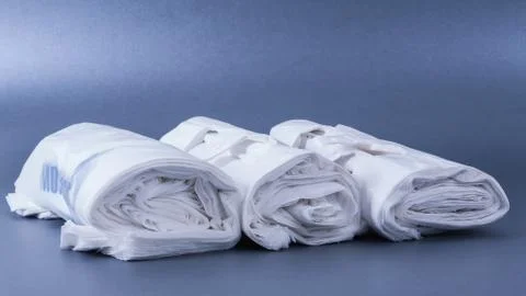 Plastic rolled up bag Stock Photos
