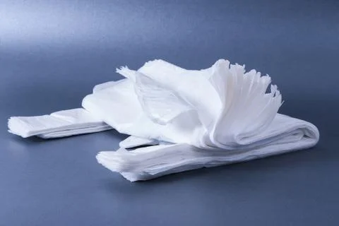 Plastic rolled up bag Stock Photos