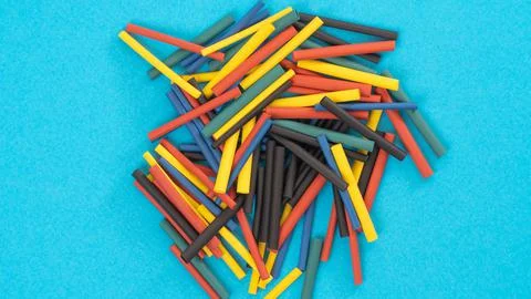 Plastic, rubber wire on a blue background Stock Photos