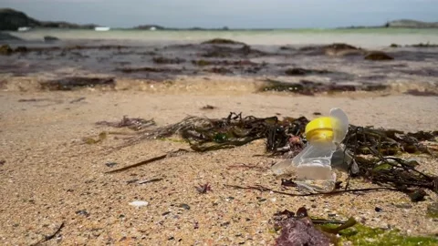 Plastic rubbish on beach Video stock 159232821