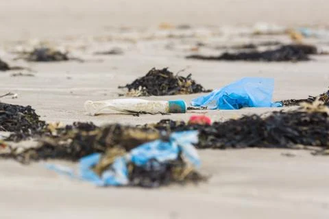Plastic Rubbish on the Beach Stock Photos