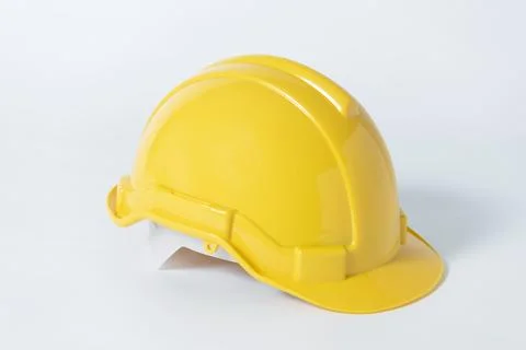 Plastic safety helmet for engineer on gray background. 写真素材
