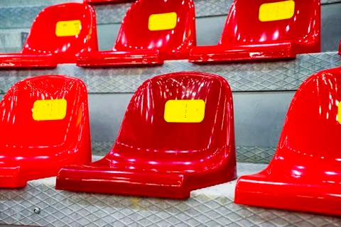 Plastic seats at the stadium Stock Photos