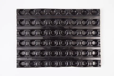 Plastic seedbed for the garden. Stock Photos