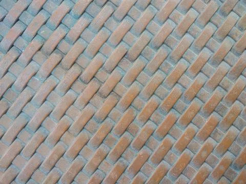 A plastic sheet surface that imitates the woven pattern of rattan or bamboo Stock Photos