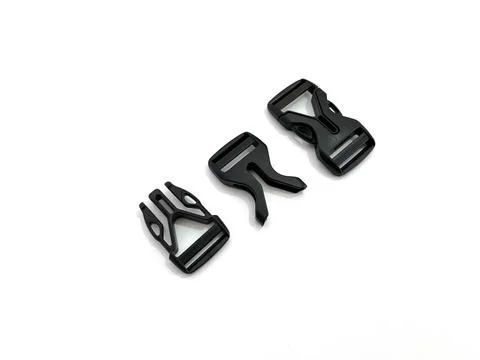 Plastic side release buckles in black Stock Photos