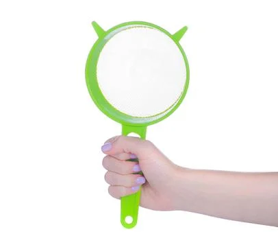 Plastic sieve in hand Stock Photos