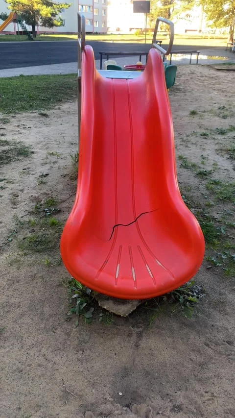 Plastic slide on the playground. Vertical video Stock Footage 287942233