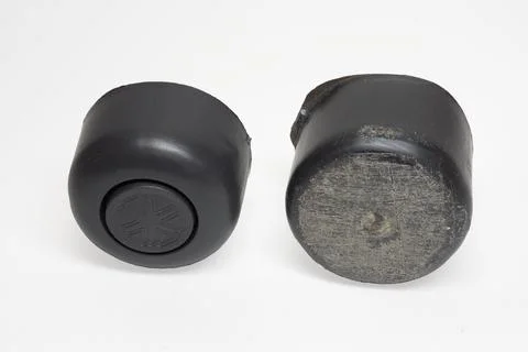 Plastic sofa legs. adjustable leveling leg for replacement of old worn sofa.. Stock Photos