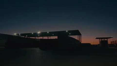 Plastic Sorting Facility Building Exterior at Sunset with Warm Lighting 库存影片 331166608