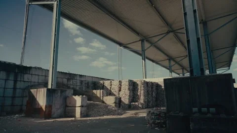 Plastic Sorting Facility with Compressed Cubes of Recycled Waste Materials 库存影片 331166523