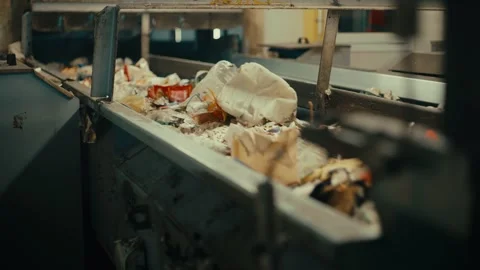 Plastic Sorting Facility Conveyor Belt Moving Waste for Recycling Process 库存影片 331166537
