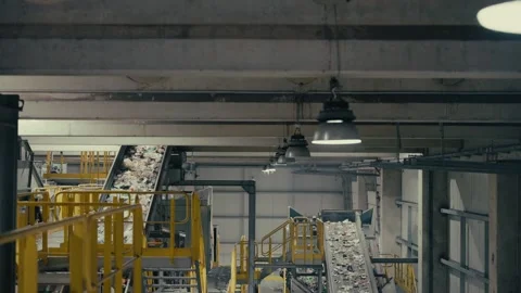 Plastic Sorting Facility with Conveyor Belts Moving Recycled Materials 库存影片 331166504