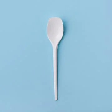 Plastic spoon on blue background, Stock Photos