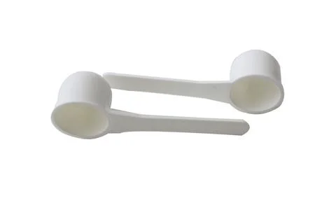 Plastic spoon in different colors Foto stock