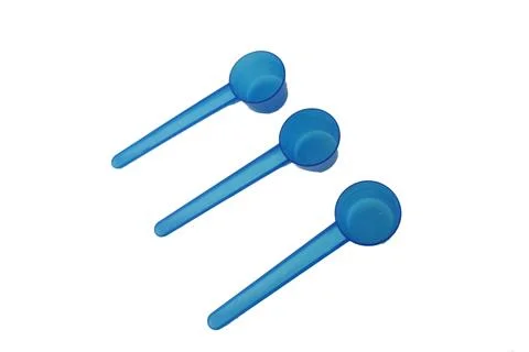 Plastic spoon in different colors Stock Photos