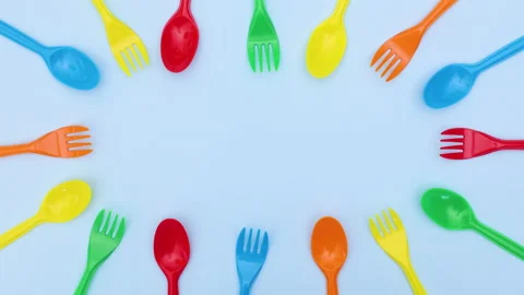 Plastic spoons and forks frame moving -Stop motion Stock-Footage 134827802