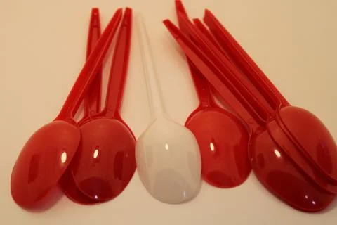 Plastic spoons for use in kitchen plastic utensils are very common in kitchen Stock Photos