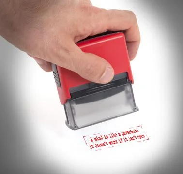 Plastic stamp in hand, isolated Foto stock