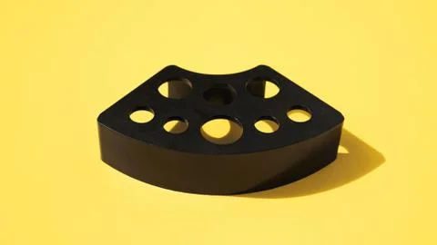 Plastic stand for tattoo ink caps on yellow Stock Photos