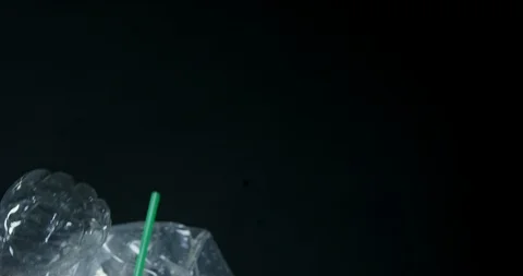 Plastic Straws And Bottles Picked Up By Out Of Water Dripping  Stock Footage 113383767
