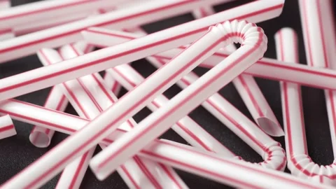 Plastic straws close up, single use disposable contamination and microplastics Video stock 162075321