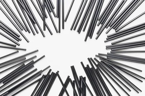 Plastic straws on white background, environment concept Stock Photos