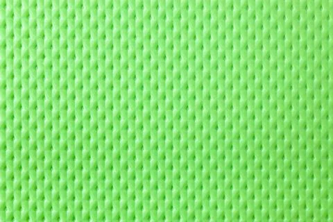 Plastic surface texture background featuring a precise arrangement of tiny Stock Photos