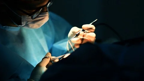 Plastic surgeon operates on a patient in the operating room. blepharoplasty Stock Footage 105155104