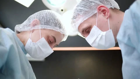 A plastic surgeon performs medical manipulations Vídeo Stock 191908772