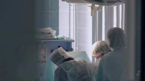 Plastic surgeons busy with completing the operation Stock-Footage 68930885