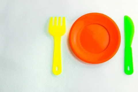 Plastic tableware for children Stock Photos