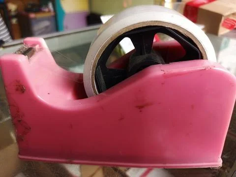 Plastic tape cutter. Stock Photos