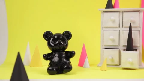 Plastic Teddy Bear being hammered Stock Footage 141231506