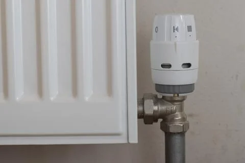 Plastic temperature regulator on battery Stock Photos