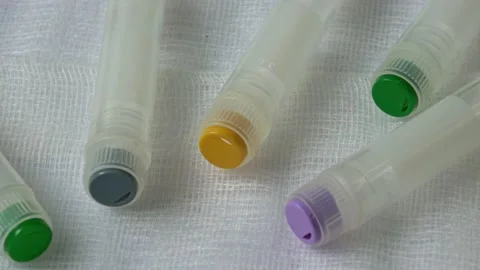Plastic test tubes with caps for the collection of samples. Medical modern me Stock Footage 166146701