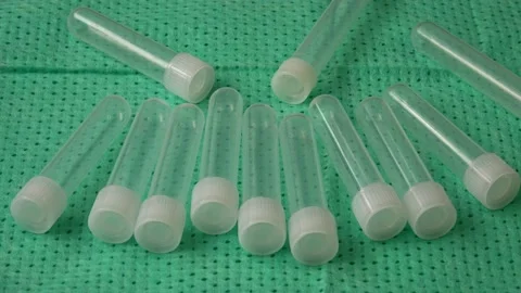 Plastic test tubes with caps for the collection of samples. Medical modern me Stock Footage 166199277