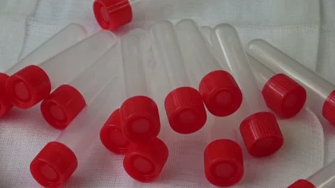 Plastic test tubes with red caps for the collection of samples. Medical moder Stock Footage 166104057