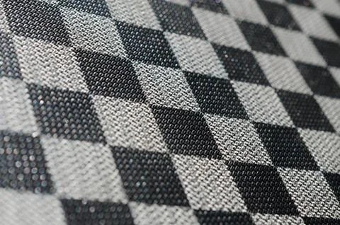 Plastic texture in the form of a very small cloth binding, painted in black a Stock Photos