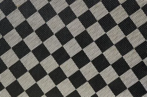 Plastic texture in the form of a very small cloth binding, painted in black a Stock Photos