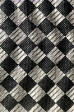 Plastic texture in the form of a very small cloth binding, painted in black a Stock Photos