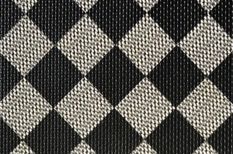 Plastic texture in the form of a very small cloth binding, painted in black a Stock Photos