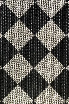 Plastic texture in the form of a very small cloth binding, painted in black a Stock Photos