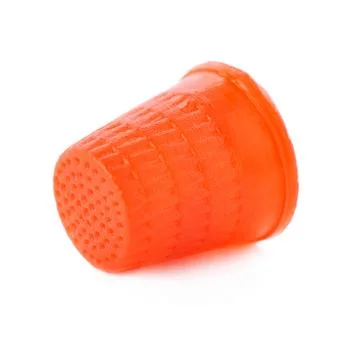 Plastic thimble isolated over the white background Stock Photos